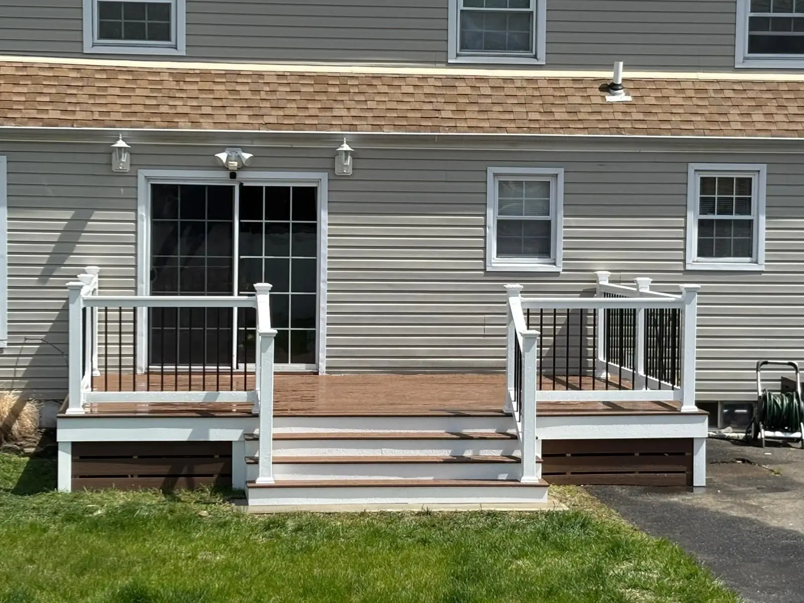 Front Entry Deck — Composite front entry deck with white railing and aluminum balusters, Bergen County NJ