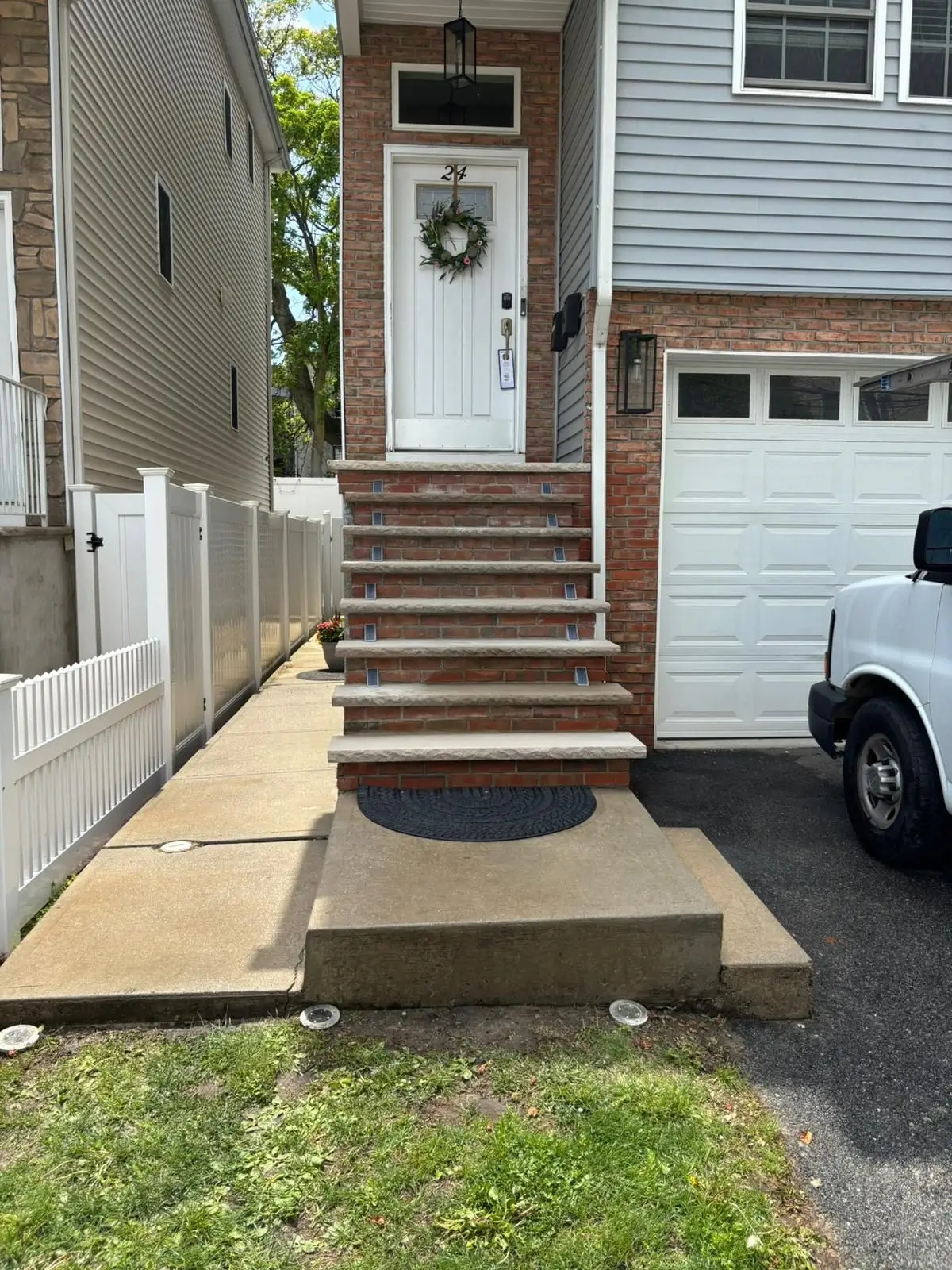 Brick Stoop & Steps — Brick front entrance stoop with stone cap steps and lighting, Bergen County NJ