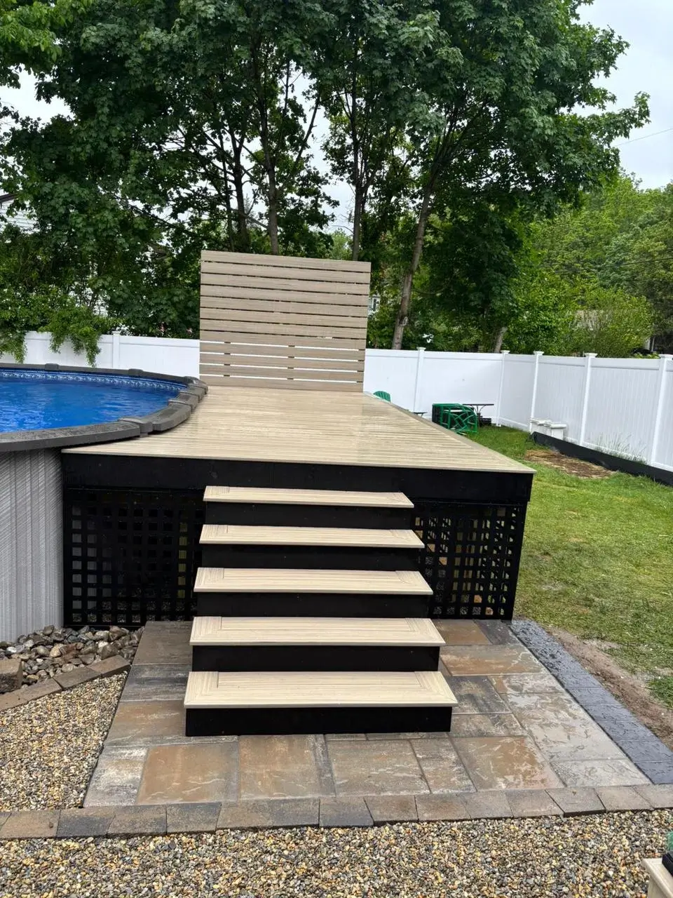 Pool Deck & Stairs — Above-ground pool deck with custom stairs and paver landing, Bergen County NJ